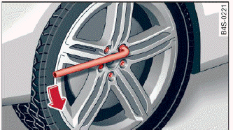 Fig. 180 Wheel: loosening the wheel bolts